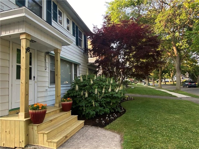 78 Falleson Rd, Rochester, NY 14612 - view of home's exterior featuring a lawn