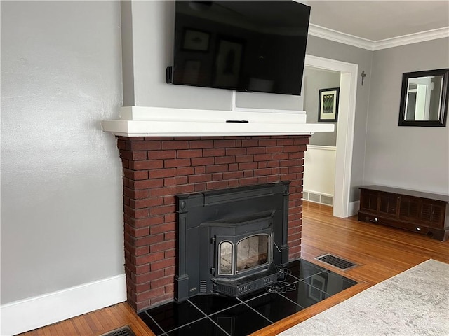 78 Falleson Rd, Rochester, NY 14612 - detailed view of wood finished floors, ornamental molding, and a wood stove