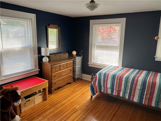 78 Falleson Rd, Rochester, NY 14612 - bedroom with light wood-style floors and multiple windows