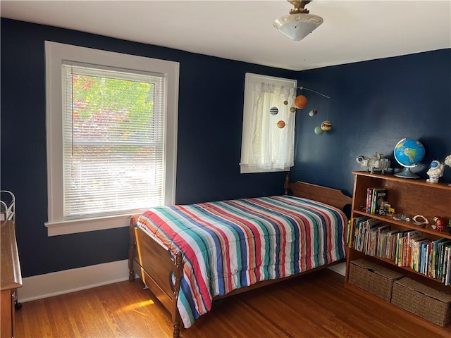 78 Falleson Rd, Rochester, NY 14612 - bedroom with wood finished floors and multiple windows