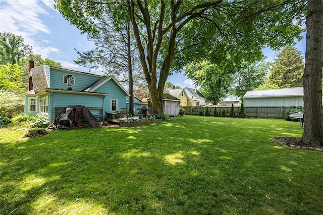 142 Holloway Rd, Brighton, NY 14610 - fenced yard featuring a deck
