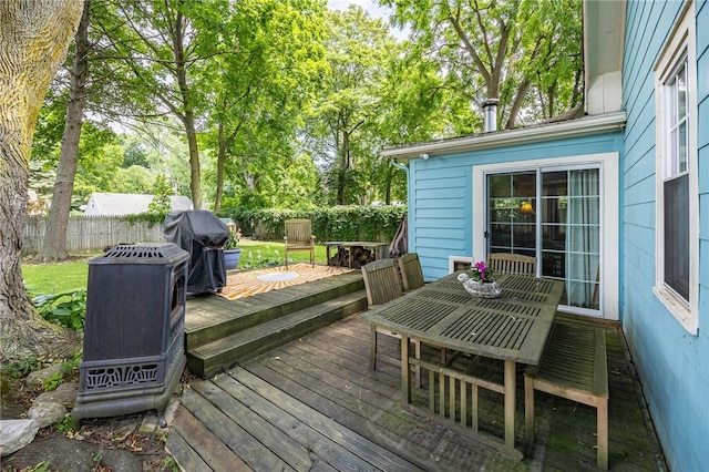 142 Holloway Rd, Brighton, NY 14610 - deck with a fenced backyard, a grill, and view of scattered trees