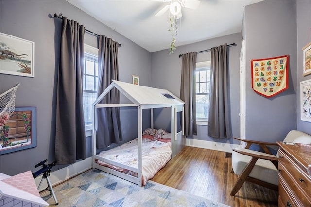 142 Holloway Rd, Brighton, NY 14610 - bedroom with wood finished floors and a ceiling fan
