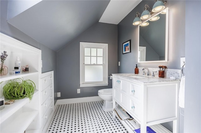 142 Holloway Rd, Brighton, NY 14610 - bathroom with vanity, lofted ceiling, and tile patterned floors