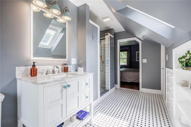 142 Holloway Rd, Brighton, NY 14610 - ensuite bathroom with vanity, a shower stall, and a skylight
