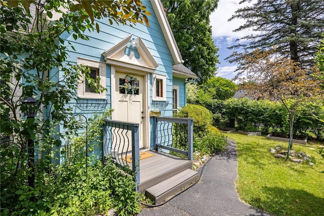 142 Holloway Rd, Brighton, NY 14610 - entrance to property with a yard