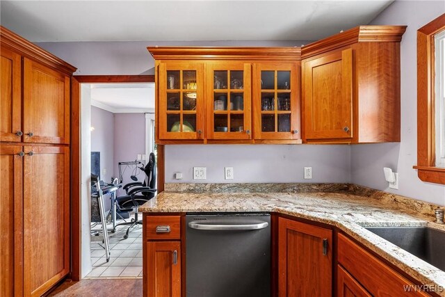 39 Colonial Ave, Lancaster, NY 14086 - kitchen featuring stainless steel dishwasher, glass insert cabinets, a desk, light stone counters, and light tile patterned floors