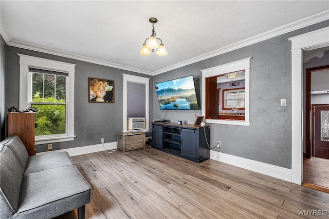 39 Colonial Ave, Lancaster, NY 14086 - living area with wood finished floors, crown molding, and a chandelier