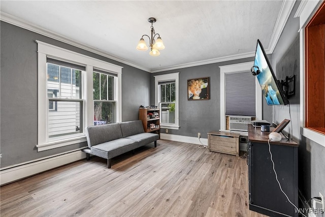 39 Colonial Ave, Lancaster, NY 14086 - sitting room with light wood finished floors, ornamental molding, a chandelier, an office area, and a baseboard heating unit