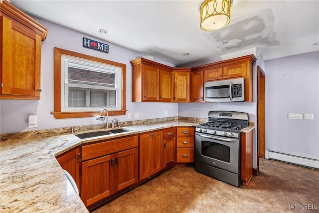 39 Colonial Ave, Lancaster, NY 14086 - kitchen featuring stainless steel appliances, baseboard heating, carpet floors, brown cabinetry, and light stone countertops