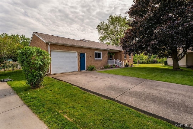 21 Niagara Cir, North Tonawanda, NY 14120 - ranch-style house featuring driveway, brick siding, a garage, and a front lawn