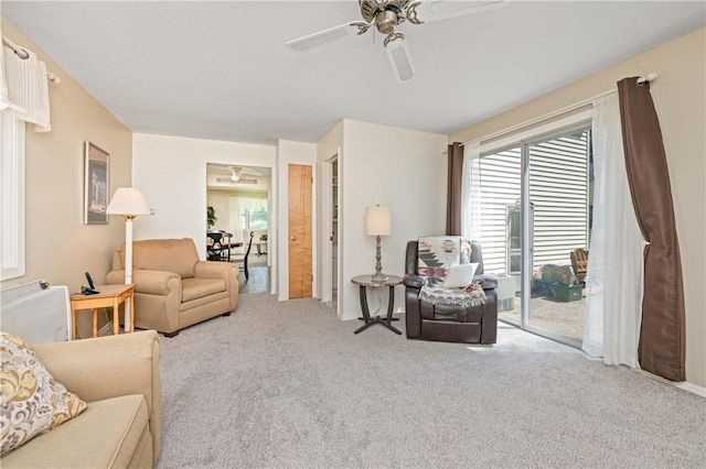 975 Whitlock Rd, Irondequoit, NY 14609 - carpeted living area featuring a ceiling fan