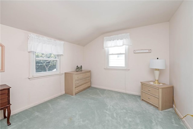 975 Whitlock Rd, Irondequoit, NY 14609 - bedroom featuring vaulted ceiling and light colored carpet