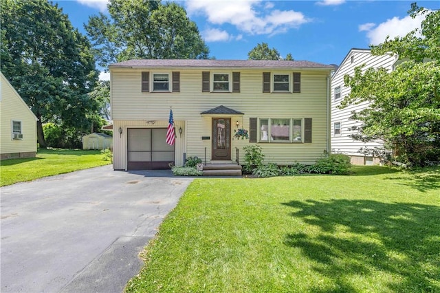 975 Whitlock Rd, Irondequoit, NY 14609 - view of front of property featuring driveway, a garage, a front lawn, and cooling unit