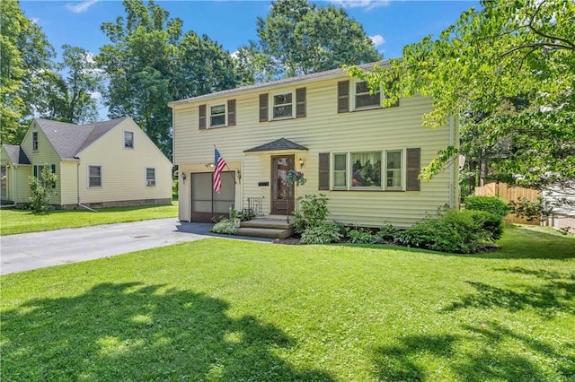 975 Whitlock Rd, Irondequoit, NY 14609 - colonial house with a garage and driveway