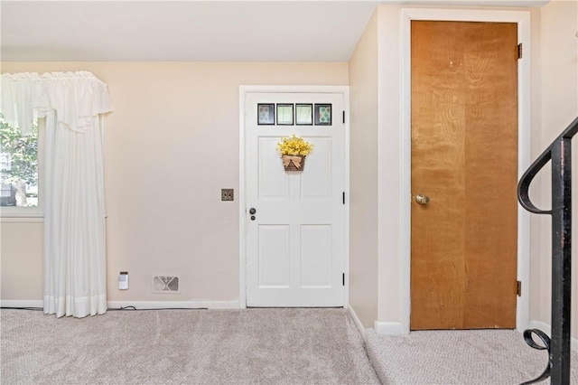 975 Whitlock Rd, Irondequoit, NY 14609 - carpeted entryway featuring baseboards