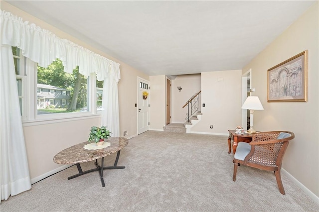 975 Whitlock Rd, Irondequoit, NY 14609 - sitting room with stairs and carpet