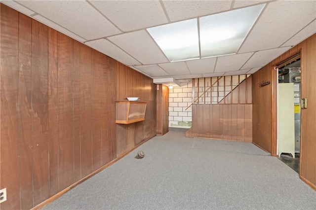 975 Whitlock Rd, Irondequoit, NY 14609 - finished basement with wood walls, carpet, a drop ceiling, and stairs