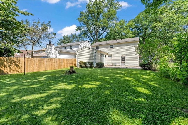 975 Whitlock Rd, Irondequoit, NY 14609 - back of house featuring a patio