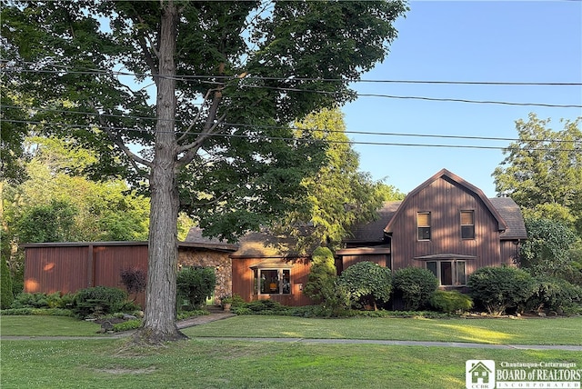 24 W 2nd St, Westfield, NY 14787 - view of front facade featuring a shingled roof and a front lawn