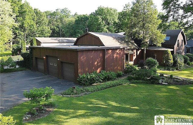24 W 2nd St, Westfield, NY 14787 - view of front of home with a front yard and a garage