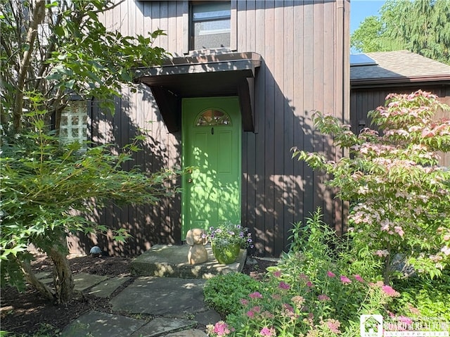24 W 2nd St, Westfield, NY 14787 - view of exterior entry featuring roof with shingles