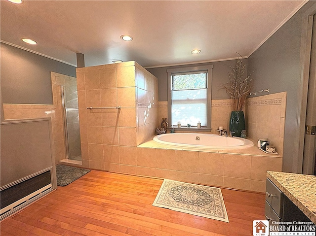 24 W 2nd St, Westfield, NY 14787 - bathroom featuring ornamental molding, wood-type flooring, a bath, a walk in shower, and recessed lighting