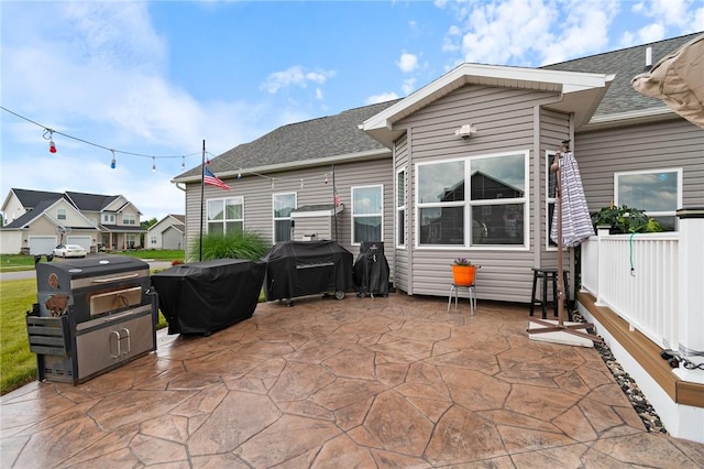 37 Etherington Cres, Chili, NY 14428 - rear view of property featuring a patio and a shingled roof