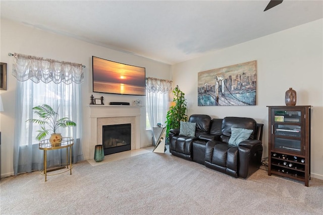 37 Etherington Cres, Chili, NY 14428 - carpeted living room featuring a fireplace with flush hearth and beverage cooler