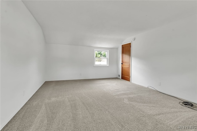 1335 James Ave, Niagara Falls, NY 14305 - carpeted spare room with lofted ceiling