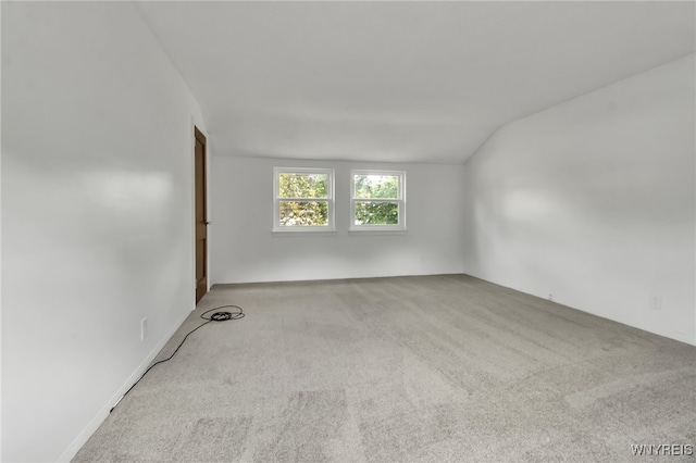 1335 James Ave, Niagara Falls, NY 14305 - carpeted spare room featuring vaulted ceiling