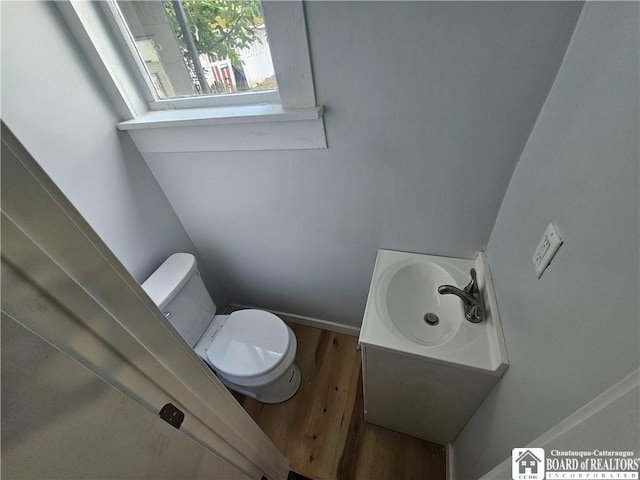 901 W Henley St, Olean, NY 14760 - bathroom with wood finished floors and vanity