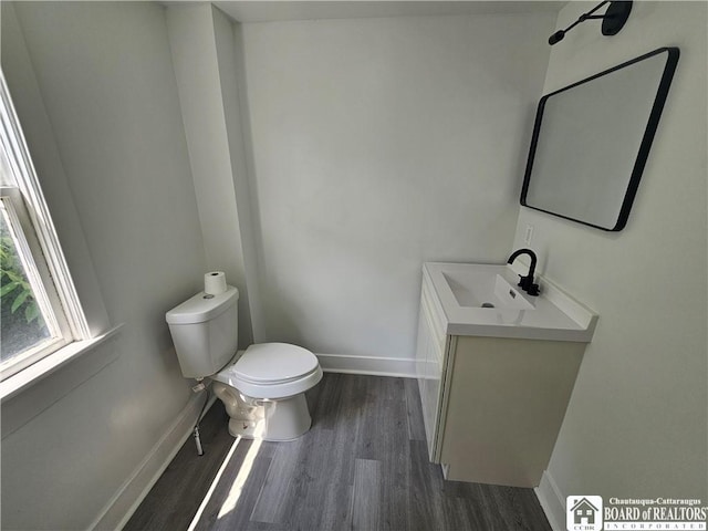 901 W Henley St, Olean, NY 14760 - bathroom featuring wood finished floors and vanity