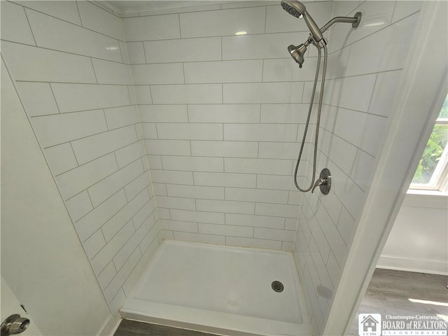 901 W Henley St, Olean, NY 14760 - full bathroom with a shower stall and wood finished floors
