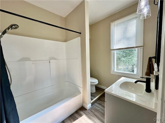 352 Sloperville Rd, Albion, NY 13302 - bathroom featuring wood finished floors, bathing tub / shower combination, and vanity
