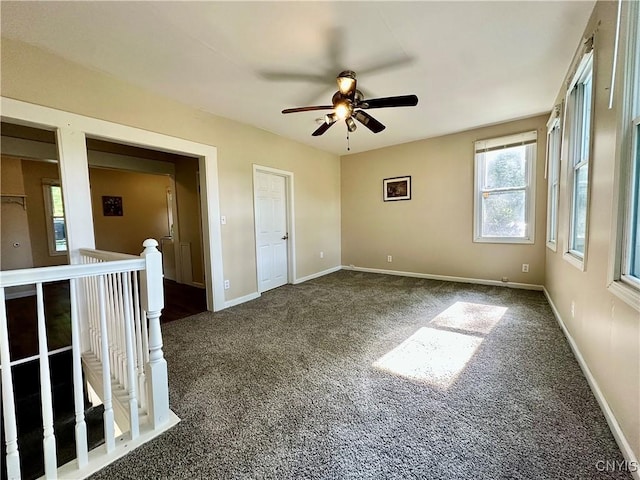 352 Sloperville Rd, Albion, NY 13302 - spare room with dark colored carpet and a ceiling fan