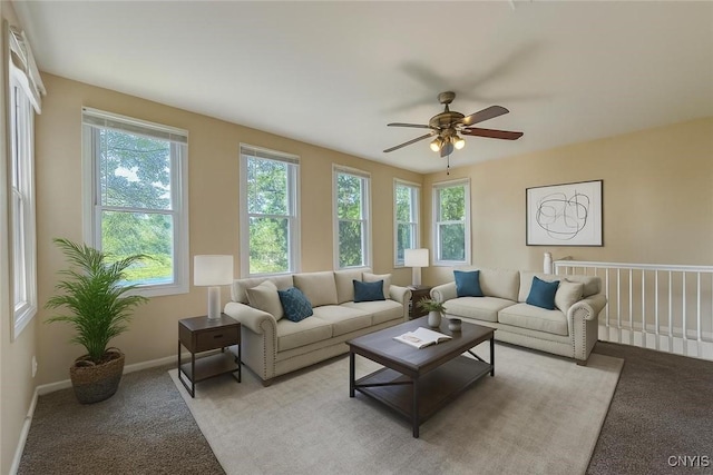 352 Sloperville Rd, Albion, NY 13302 - living room with light colored carpet and a ceiling fan