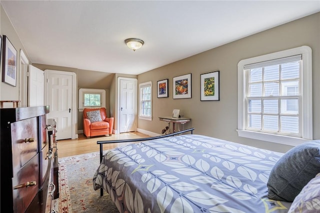 54 Covington Rd, Irondequoit, NY 14617 - bedroom with light wood finished floors and two closets