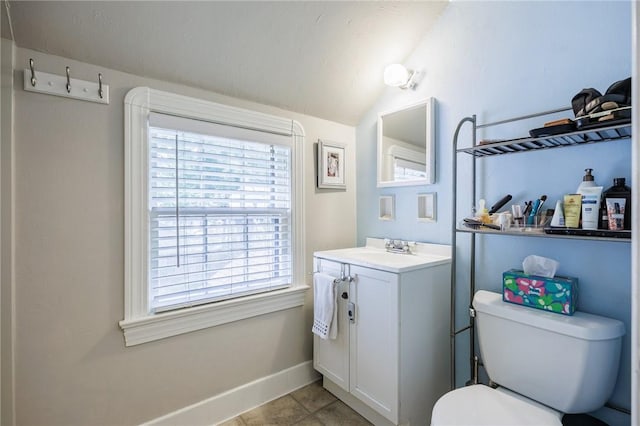 54 Covington Rd, Irondequoit, NY 14617 - half bath featuring vanity, lofted ceiling, and tile patterned flooring