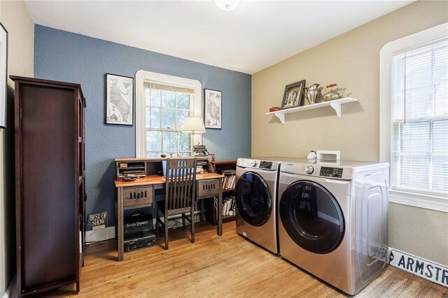 54 Covington Rd, Irondequoit, NY 14617 - laundry room featuring washer and dryer, light wood-type flooring, a textured wall, and a desk