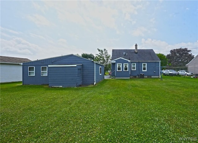 6167 N Whitham Dr, Niagara, NY 14304 - rear view of property with a yard