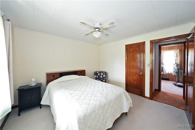 6167 N Whitham Dr, Niagara, NY 14304 - bedroom featuring light colored carpet, ceiling fan, and crown molding