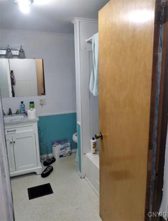 30 Wilson St, Gouverneur, NY 13642 - bathroom with vanity, ornamental molding, and shower / bath combination