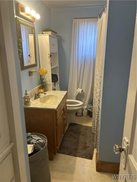 50 Hubbell Ave, Buffalo, NY 14220 - full bath featuring vanity, tile patterned flooring, and a shower with curtain