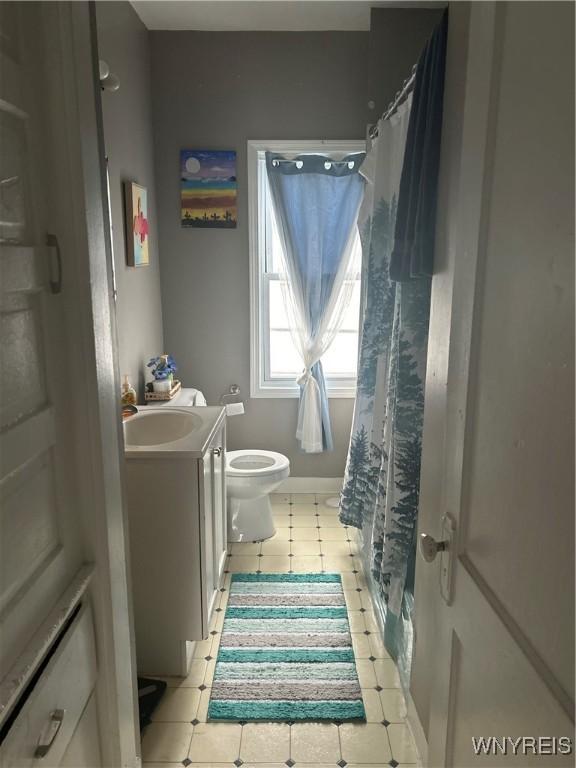50 Hubbell Ave, Buffalo, NY 14220 - full bathroom with vanity and tile patterned floors