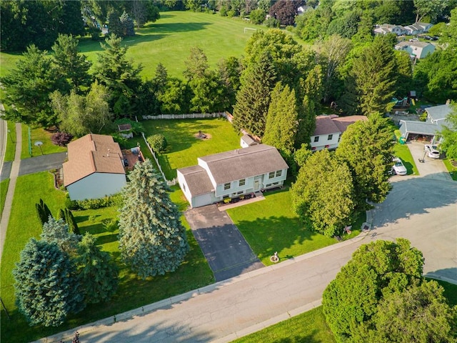 1535 Bluestem Ct, Walworth, NY 14568 - aerial view of residential area featuring a tree filled landscape