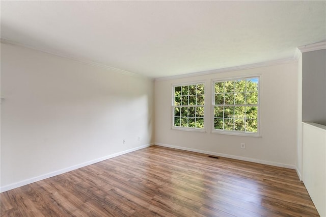 1535 Bluestem Ct, Walworth, NY 14568 - spare room with crown molding and wood finished floors