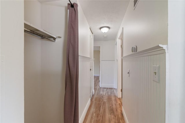 1535 Bluestem Ct, Walworth, NY 14568 - hall featuring light wood-style flooring and a wainscoted wall