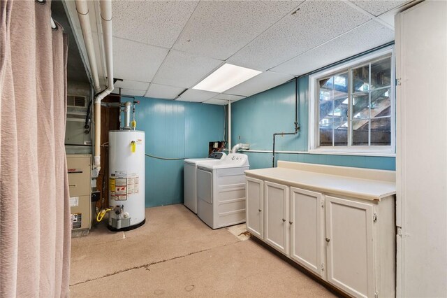 1535 Bluestem Ct, Walworth, NY 14568 - laundry room featuring water heater, washing machine and dryer, and cabinet space