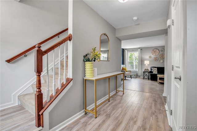 5 Scooter Ln, Hamburg, NY 14075 - hall featuring light wood finished floors and stairs